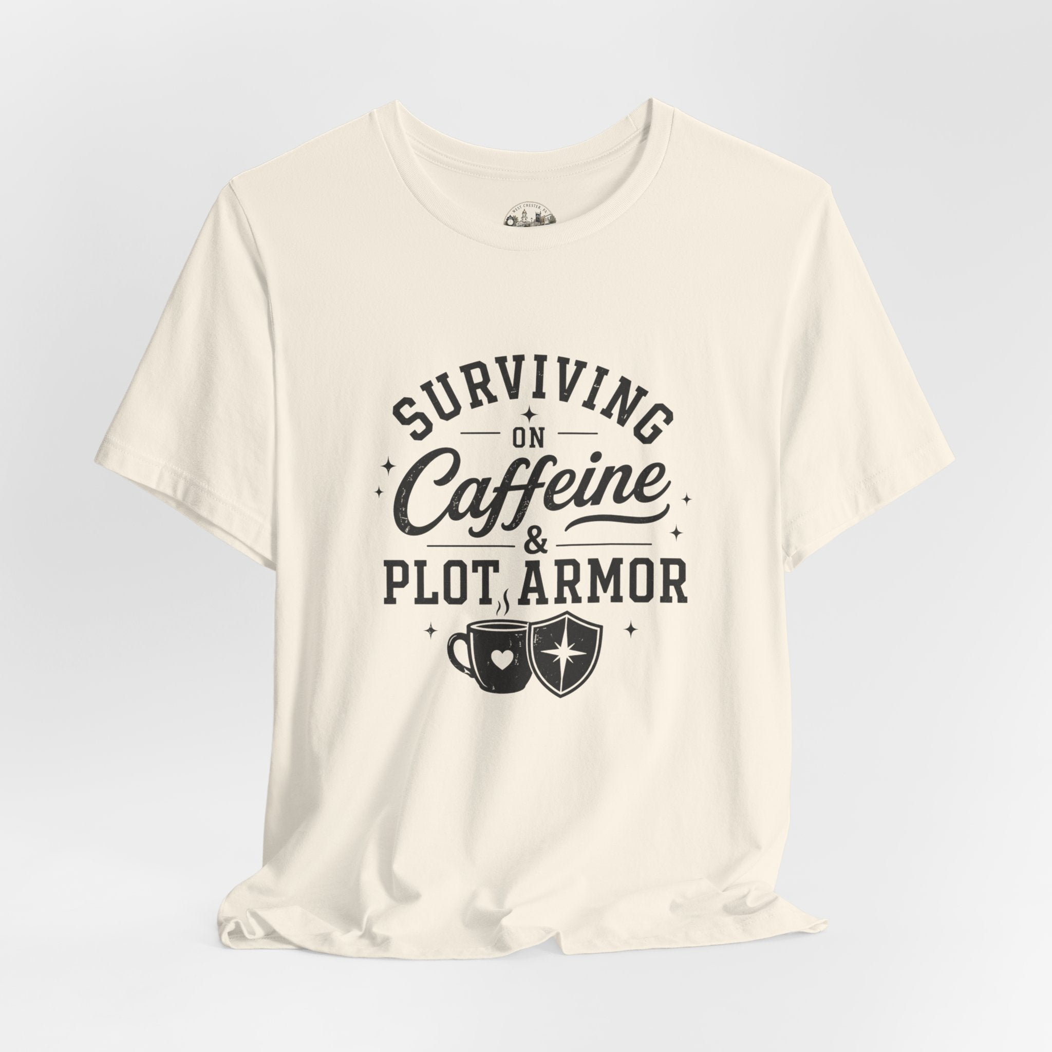 Surviving on Caffeine & Plot Armor T‑Shirt — Funny Writer Gamer Tee